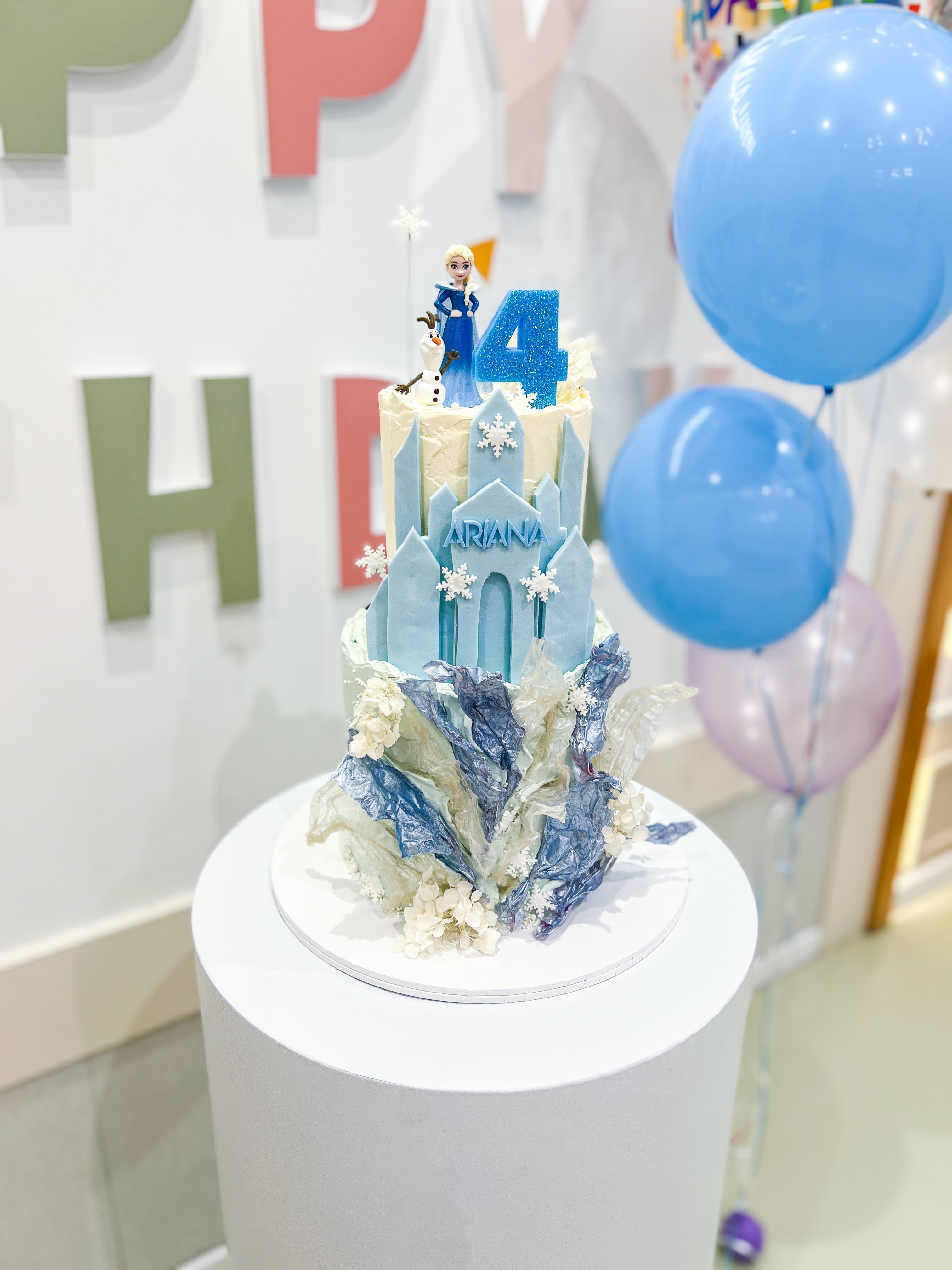 Frozen Elsa birthday cake with blue buttercream for kids party